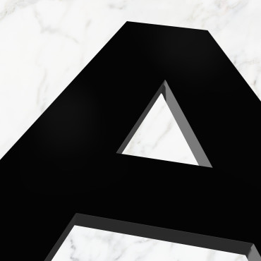 Bokstäver i svart PVC