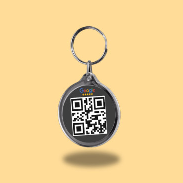 Ključek s povratnimi informacijami strank Google, povezan z vgrajenim NFC čipom.
