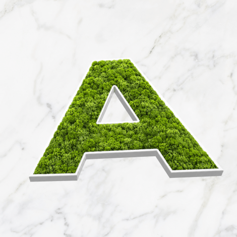 Gros plan sur la texture des herbes synthétiques appliquées sur PVC