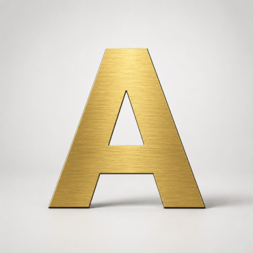 Ausgeschnittene Gold-Dibond Buchstaben, Nahaufnahme der gebürsteten Oberfläche