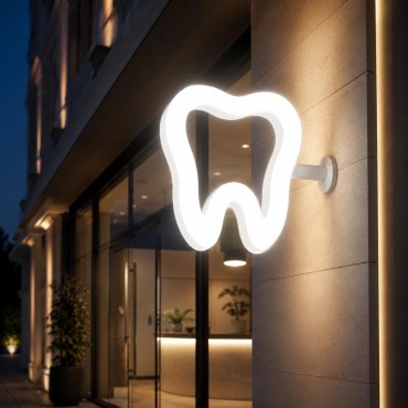 Enseigne lumineuse en forme de dent
